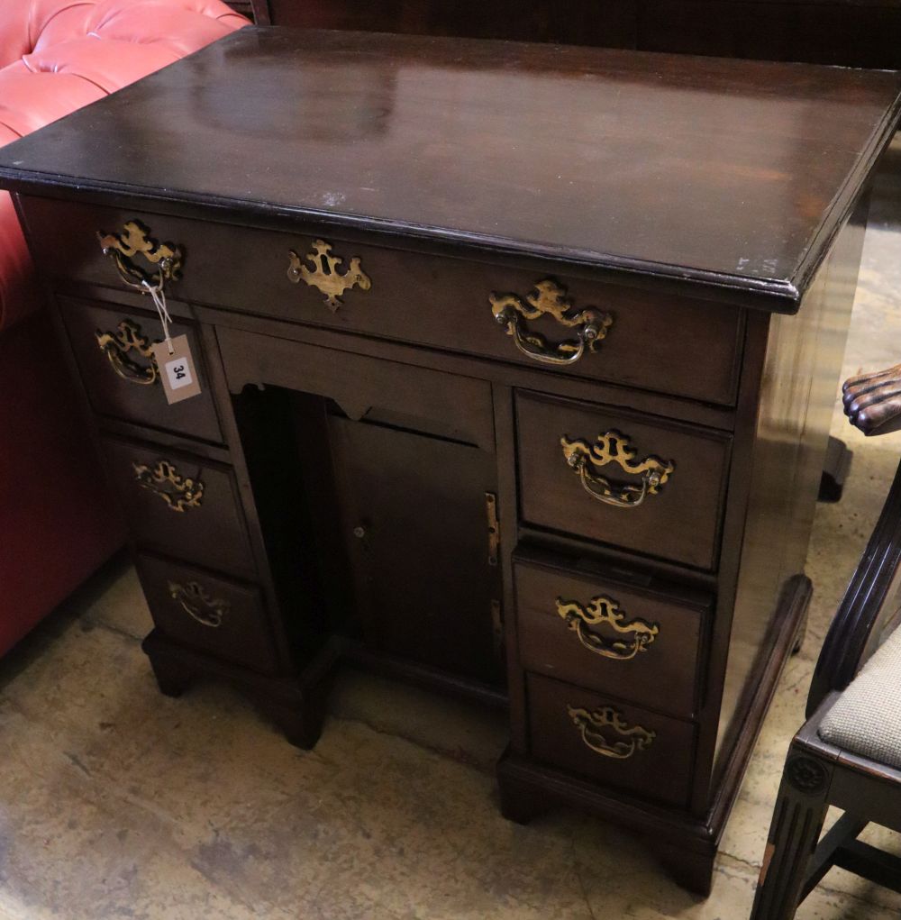 A George III mahogany kneehole desk, width 84cm depth 46cm height 76cm